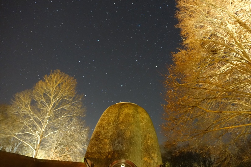 Roofless Church with lights at night